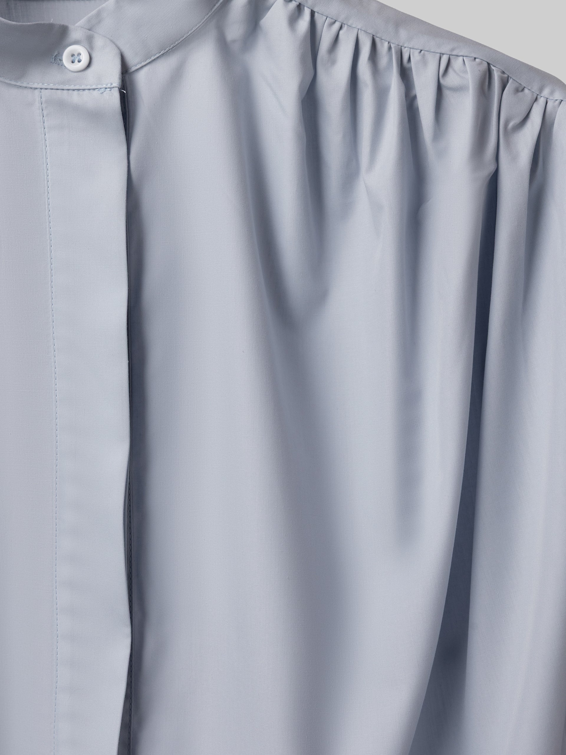 Pale Blue Curved Hem Shirt